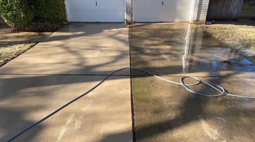Concrete driveway before and after pressure washing